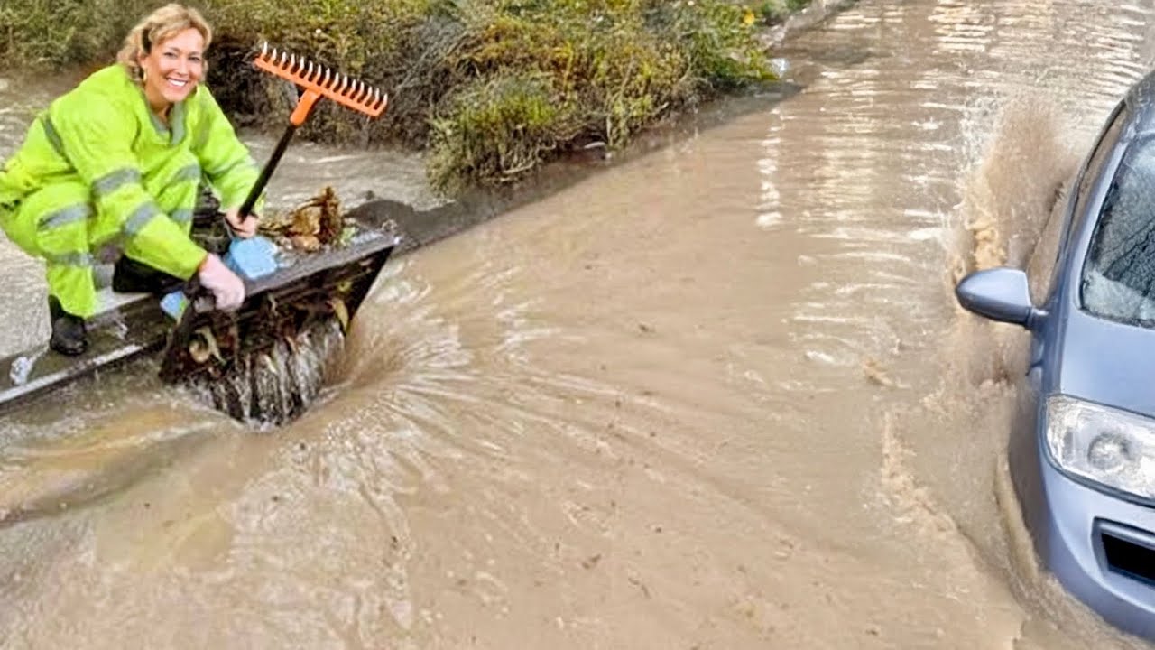 Unclogging a Giant Flooded Street Drain Watch This!