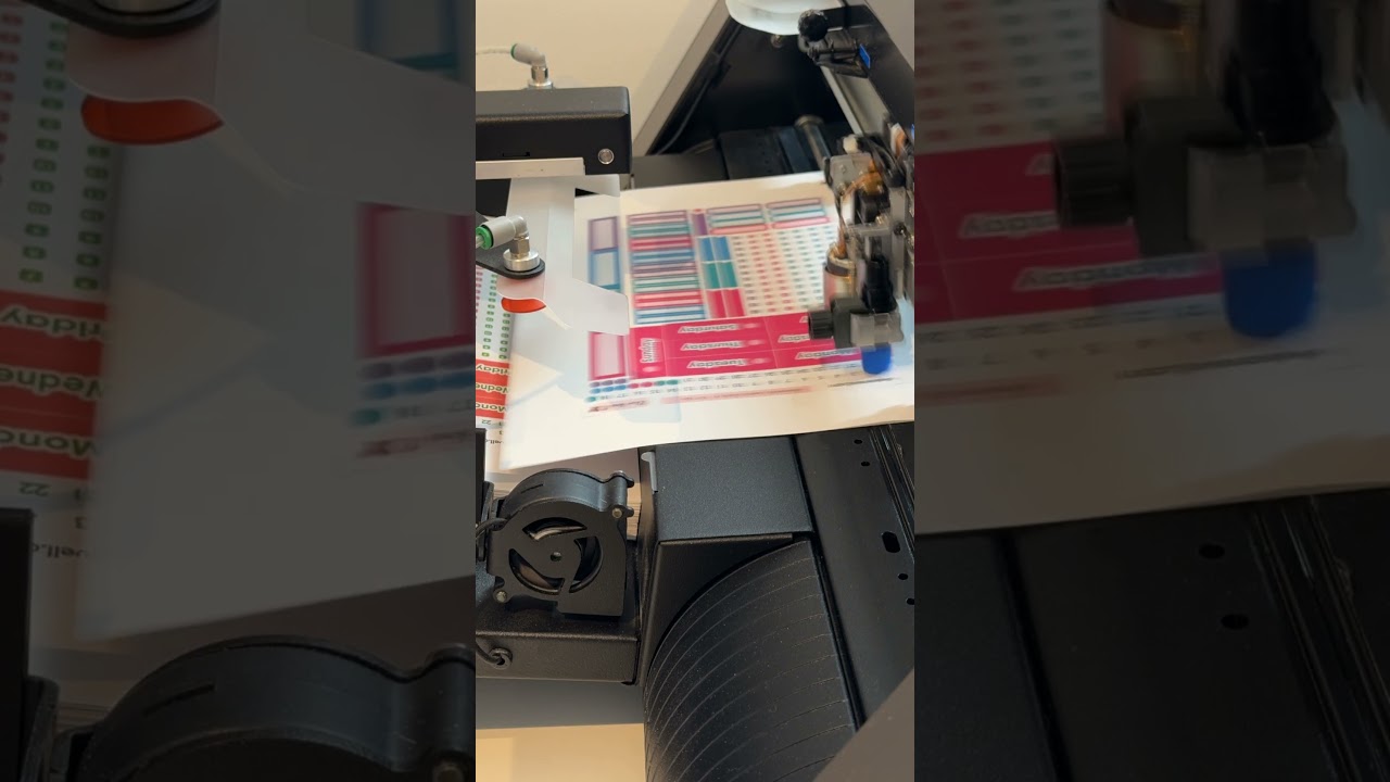 Cutting June Sticker Kits! My favorite part is when the Graphtec F-mark 2 takes over.