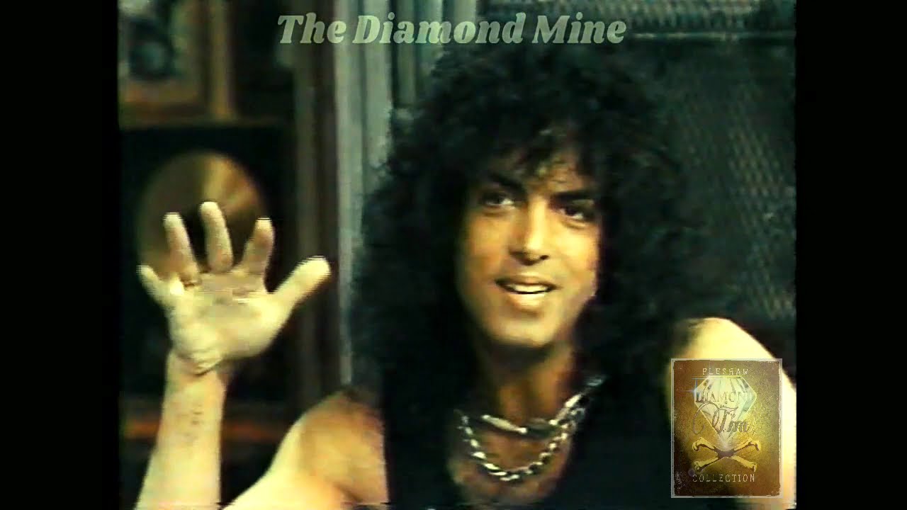 Paul Stanley of KISS & Martha Quinn of MTV flirt through promoting Animalize in the Fall of 1984