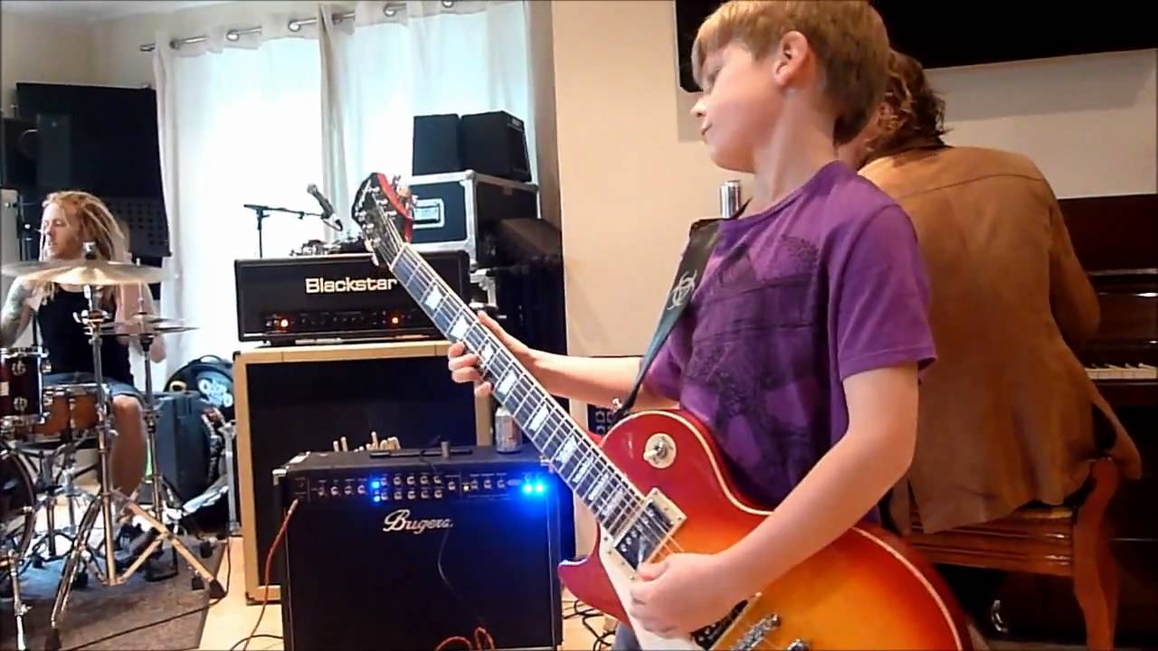 8 year old guitarist Harry Esson jams at rock school with The Crave