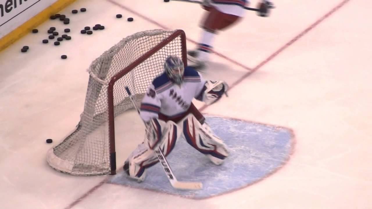 Lundqvist and Biron during pre-game warm-up at the Rangers @ Senators hockey game