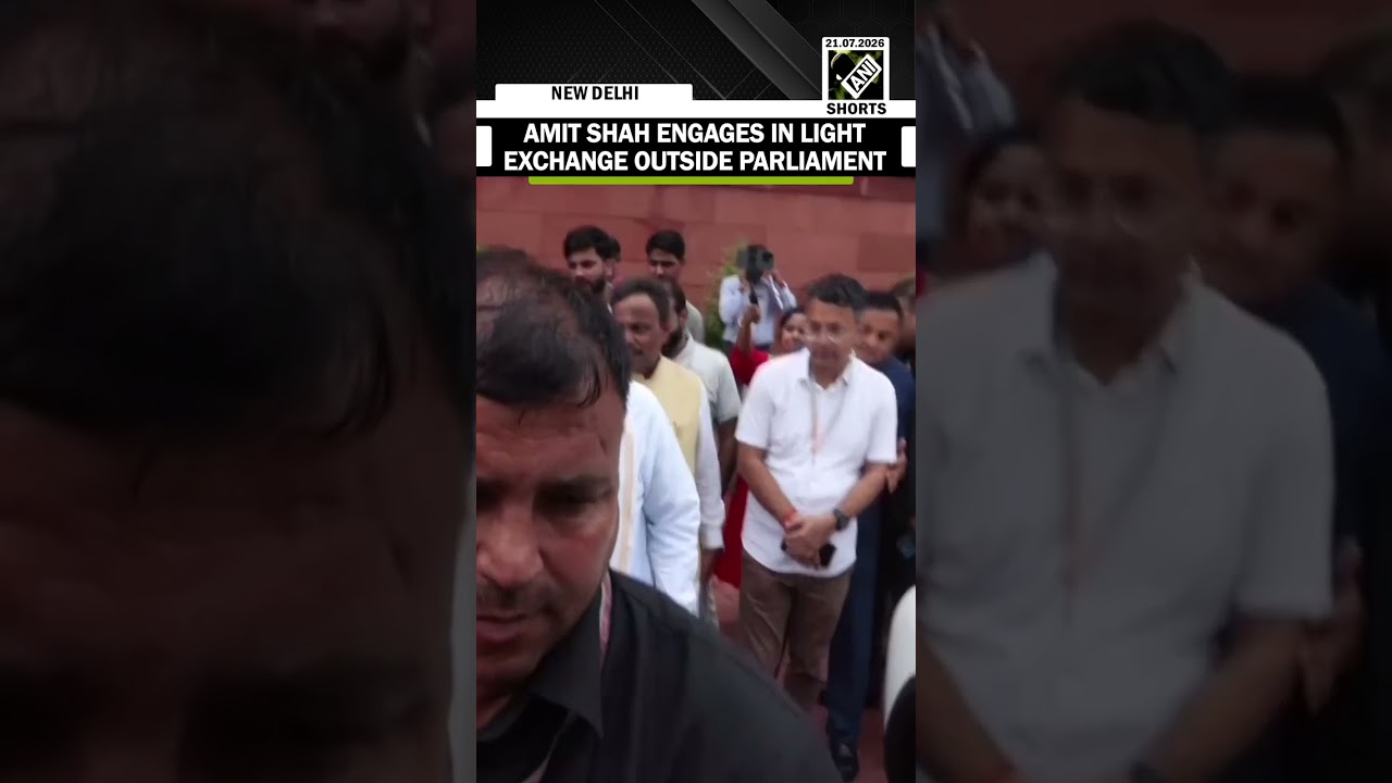 Home Minister Amit Shah engages in light exchange while leaving from Parliament
