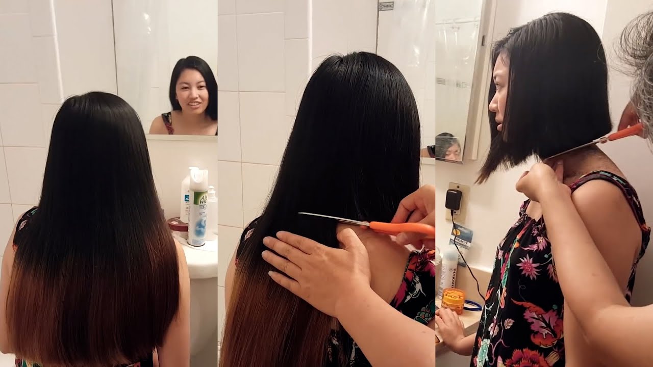 Long hair chopped off into a chin length bob at home A
