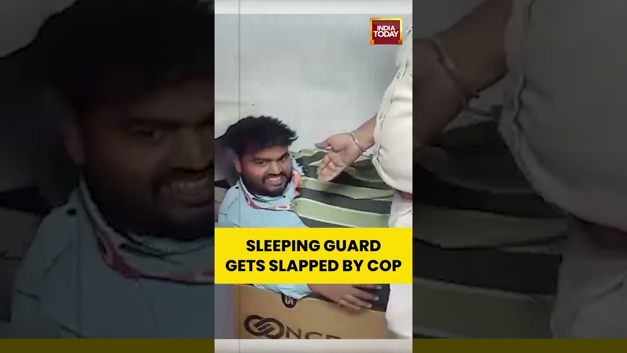 Viral Video | Sleeping Guard Gets Slapped by Cop  #shortsvideo #atm #police #indiatodayshorts