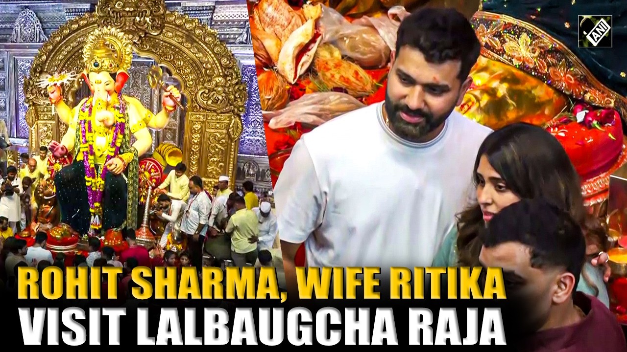 Indian cricketer Rohit Sharma and wife Ritika Sajdeh offer prayers at Lalbaugcha Raja Ganpati pandal