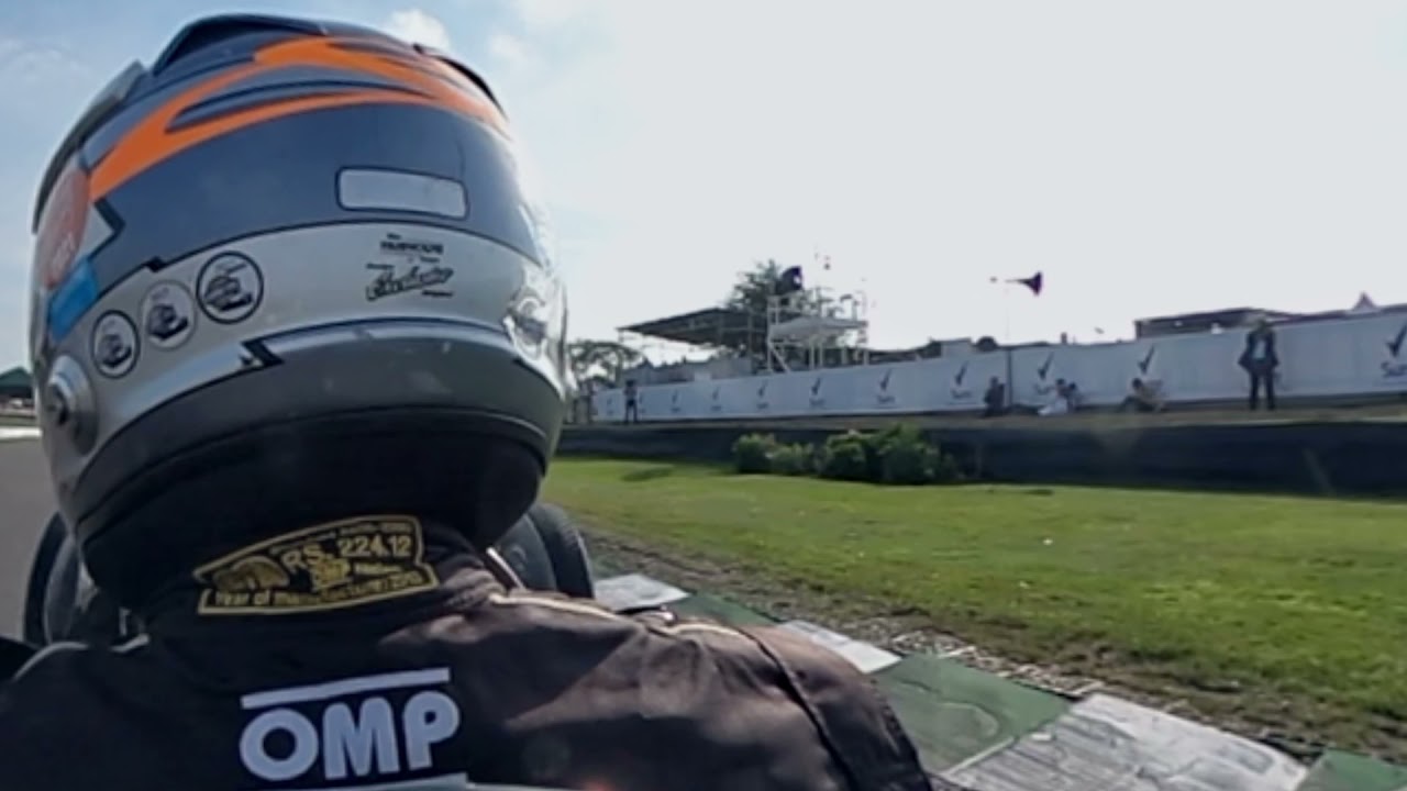 On board the V16: Down the straight at Goodwood Motor Circuit