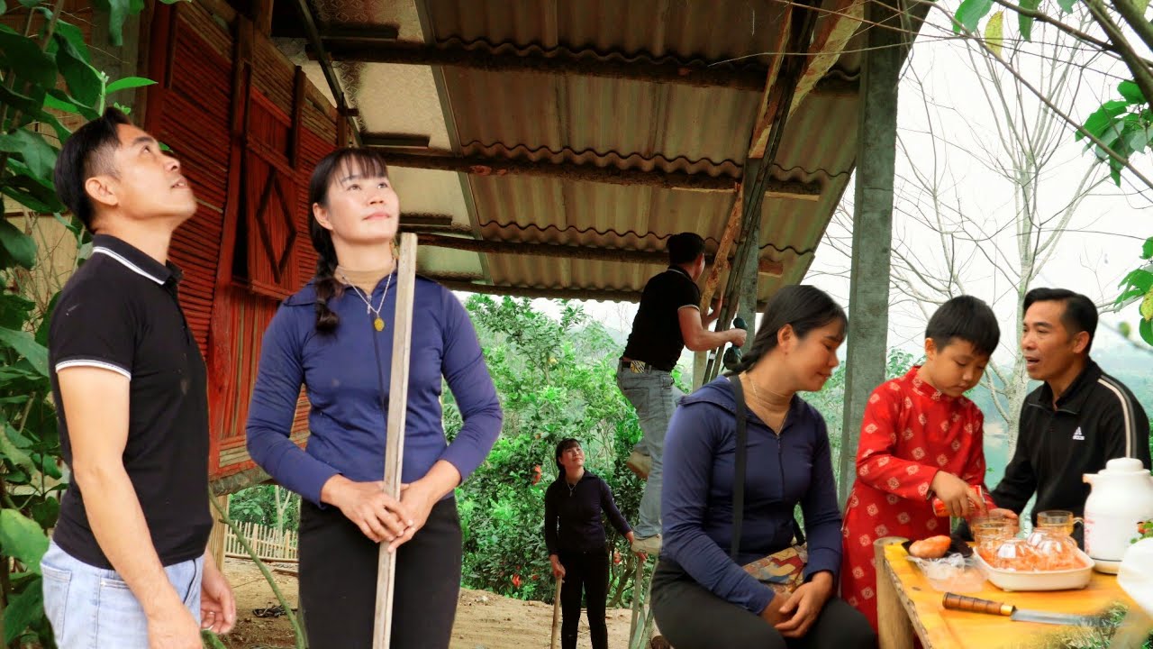 Roof completion: Thuy and Anh Men renovate their flooded kitchen into a peaceful home.