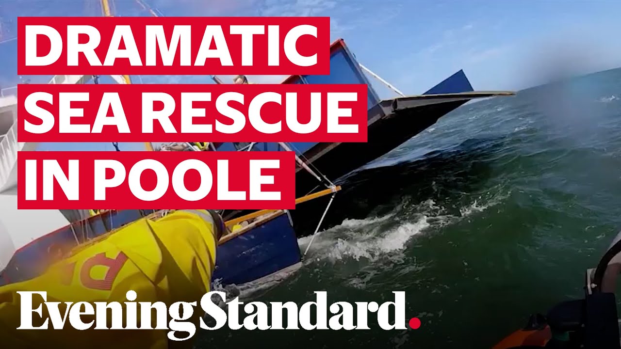 Dramatic rescue as boat gets caught under ferry