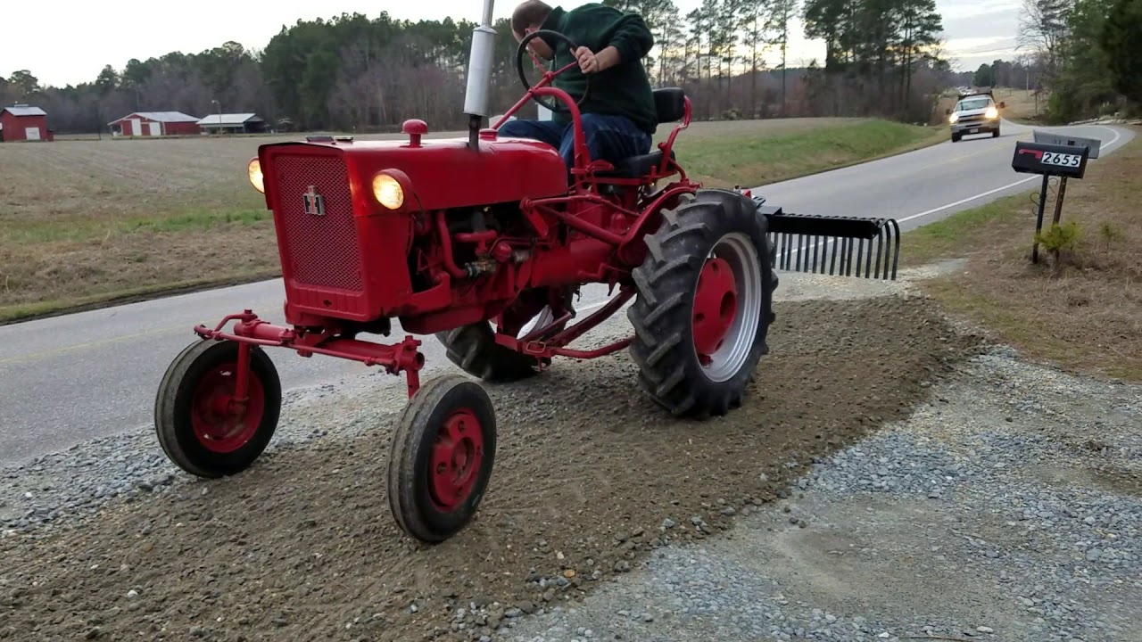 International Farmall Cub with Kodiak 5 foot landscape rake
