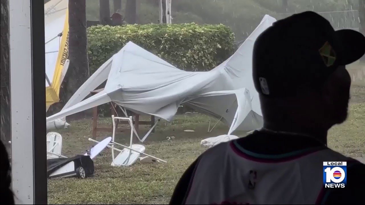 Rain floods Miami Beach streets, cut short Miami Heat Family Festival