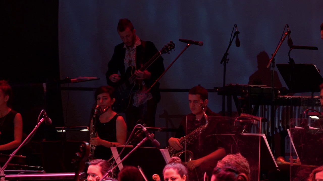 GIANT STEPS  | The Revolution Orchestra & Geshem