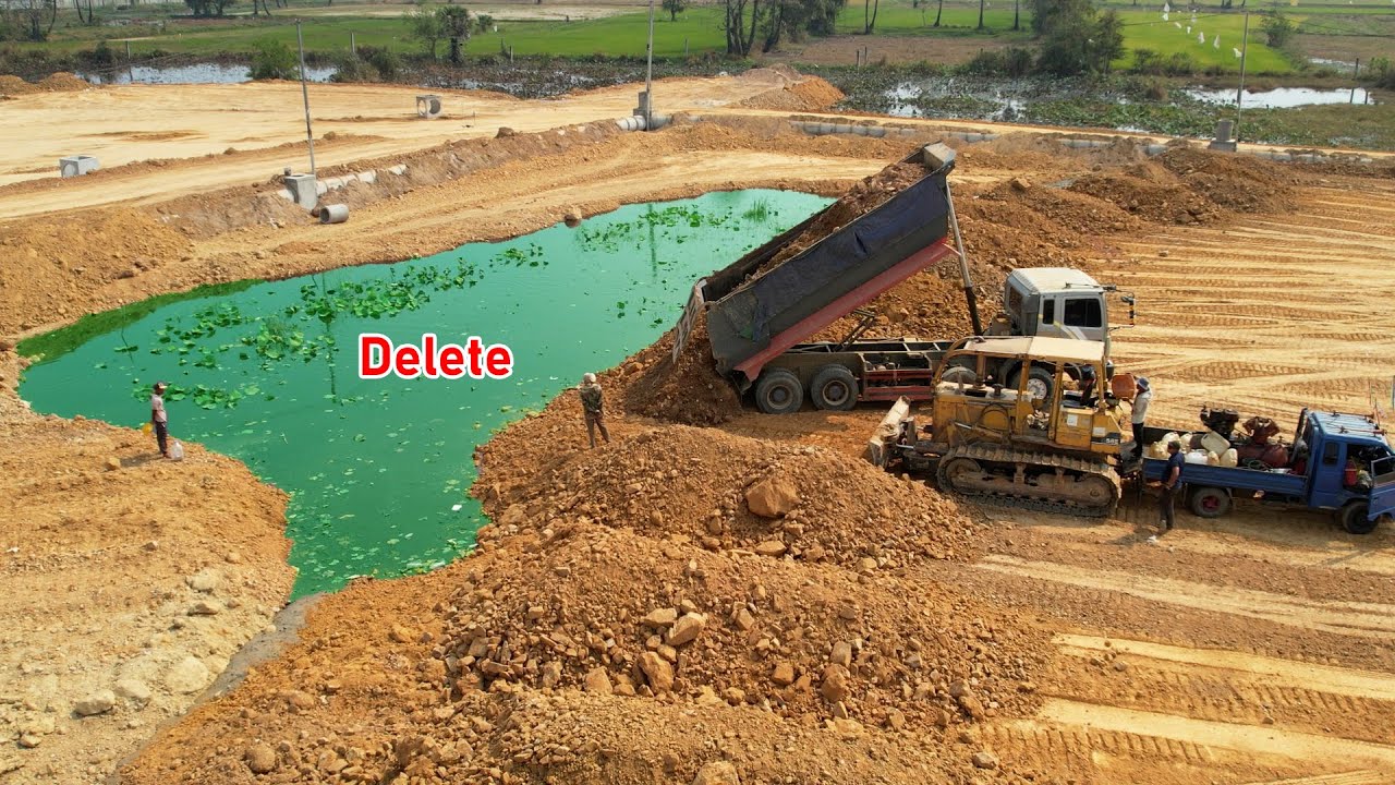 Impressive Display With Might Strong Power Bulldozer Pushing Red Soil Delete Some Part of Lake