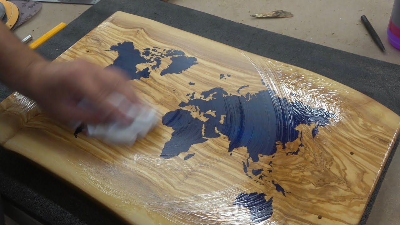 I magically carved the entire WORLD map into olive wood to fill with resin