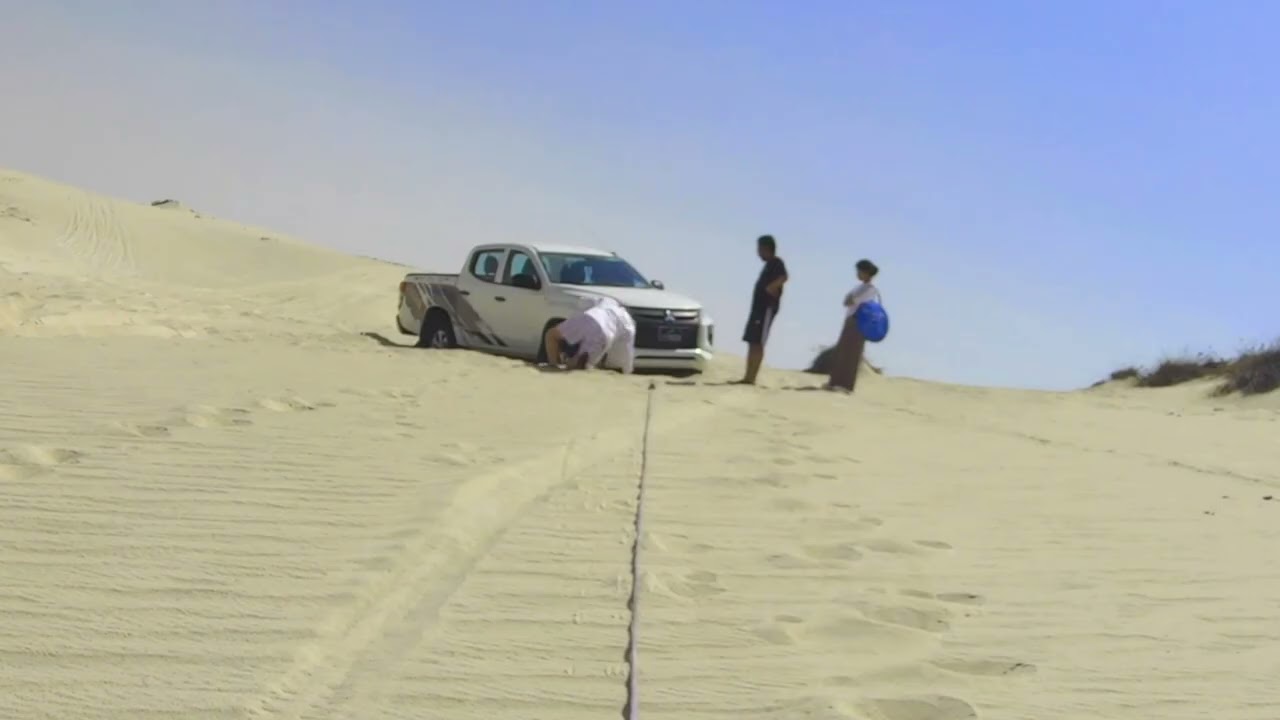 Recovery of a Mitsubishi Pick up truck stuck in sand dunes