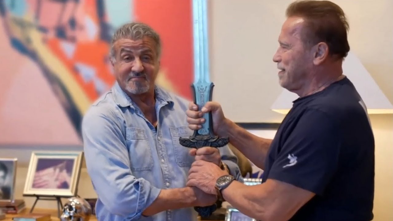 Sylvester Stallone Holds Arnold's Conan Sword!