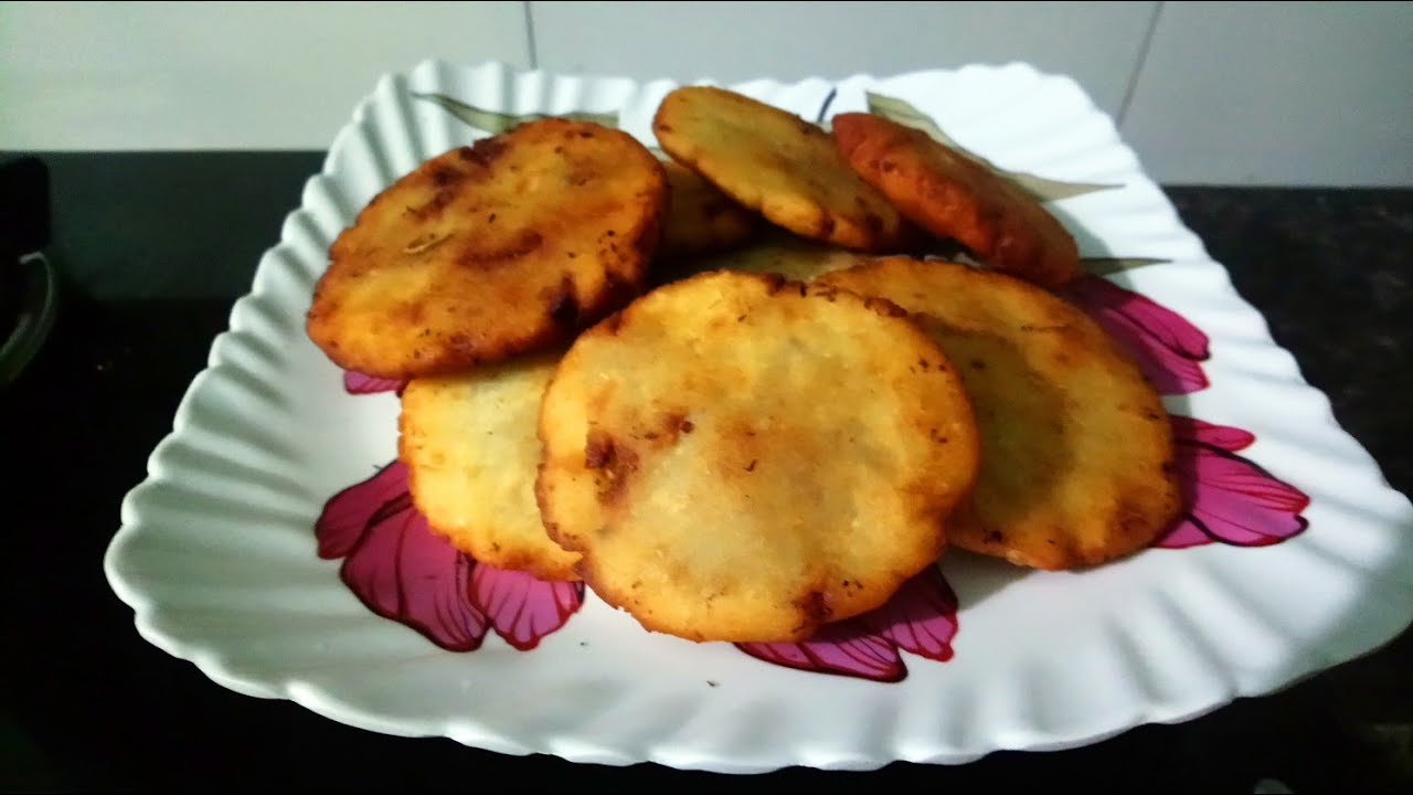 Simple and tasty sweet rice puri stuffed with coconut (breakfast) recipe