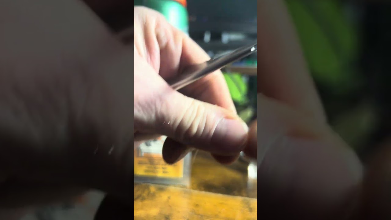 Tying an adjustable sliding bait rig for Maine trolling. 