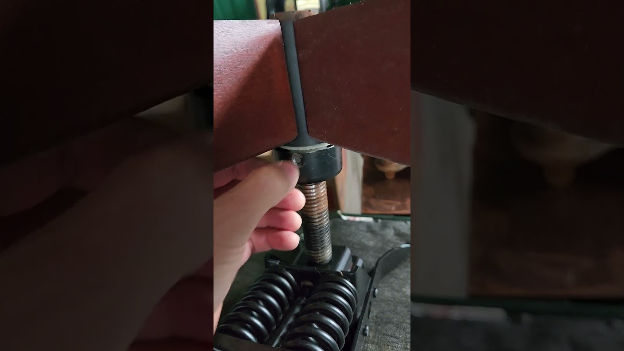Adjust the height of an antique office chair