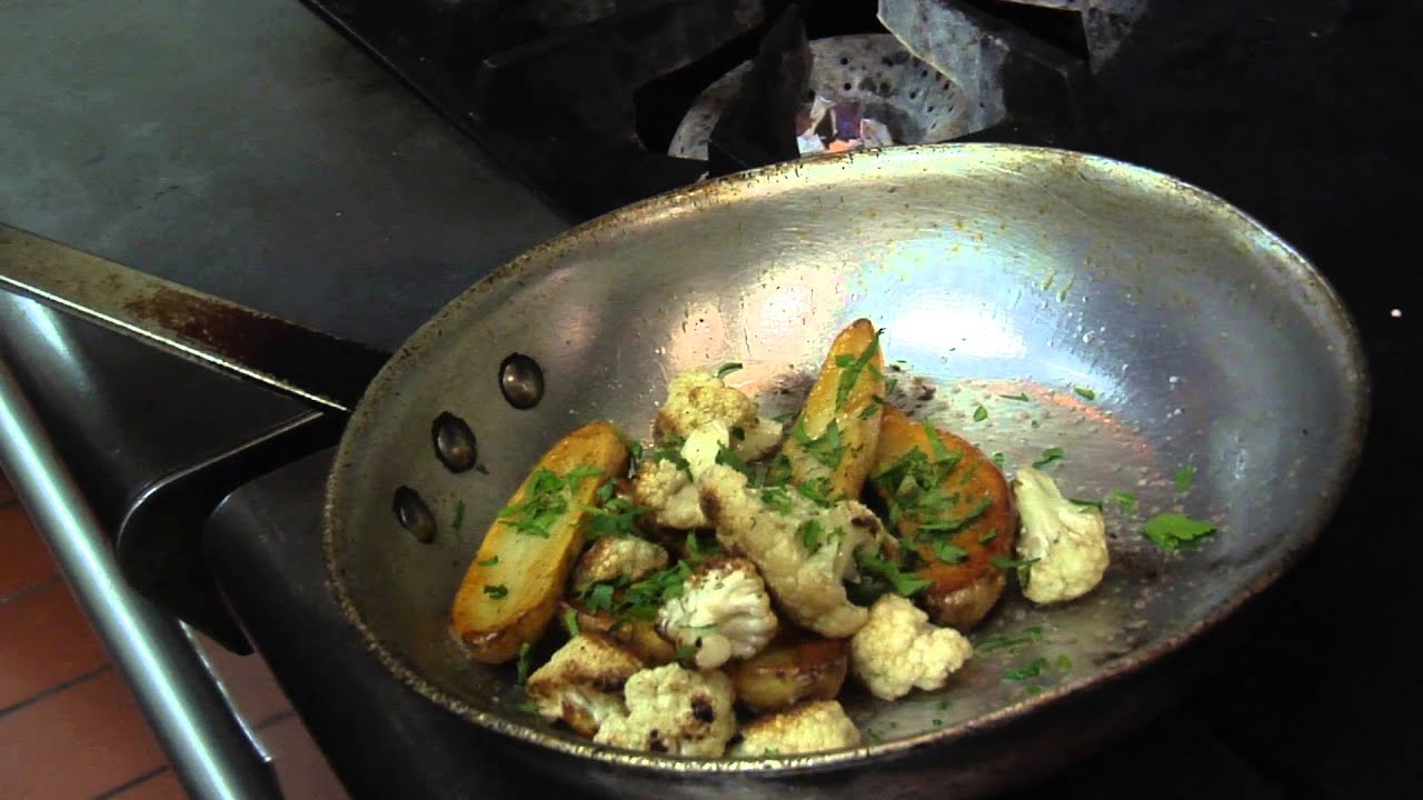 Brown Trout Makes Hanger Steak w/Fingerling Potatoes, Cauliflower & Arugula