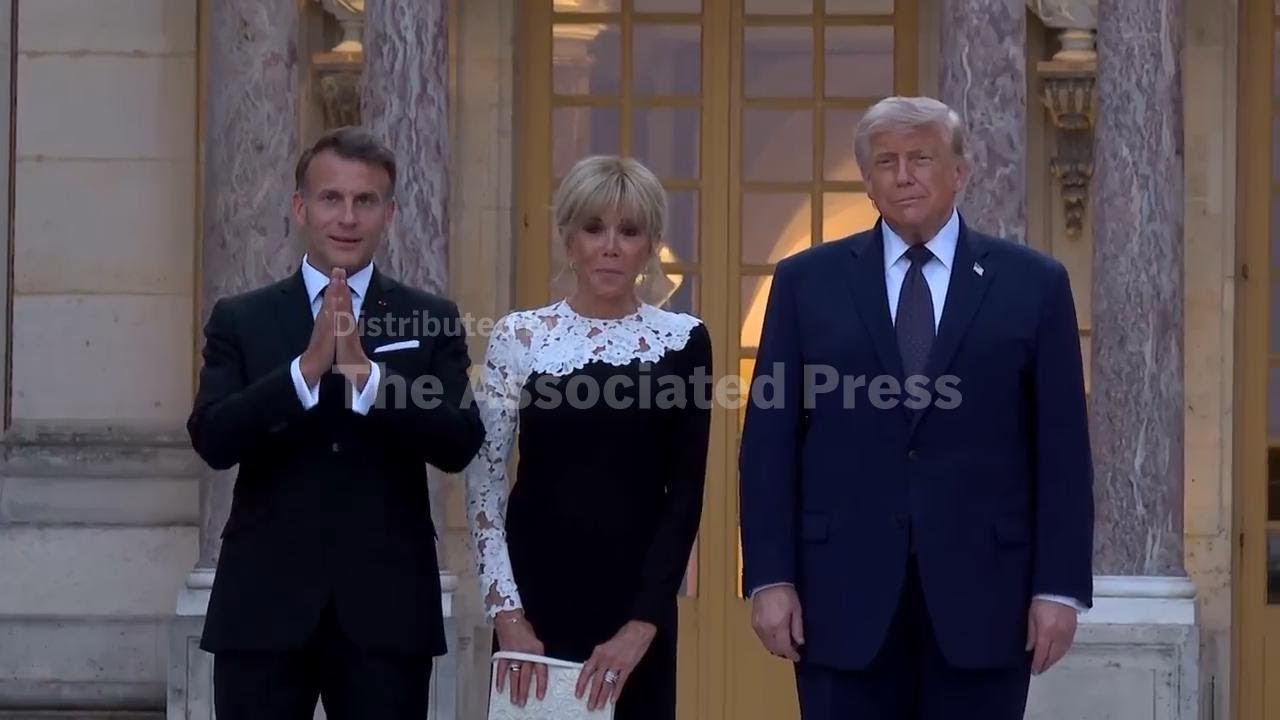 Trump is welcomed to Versailles by Macron ahead of dinner at the Palace