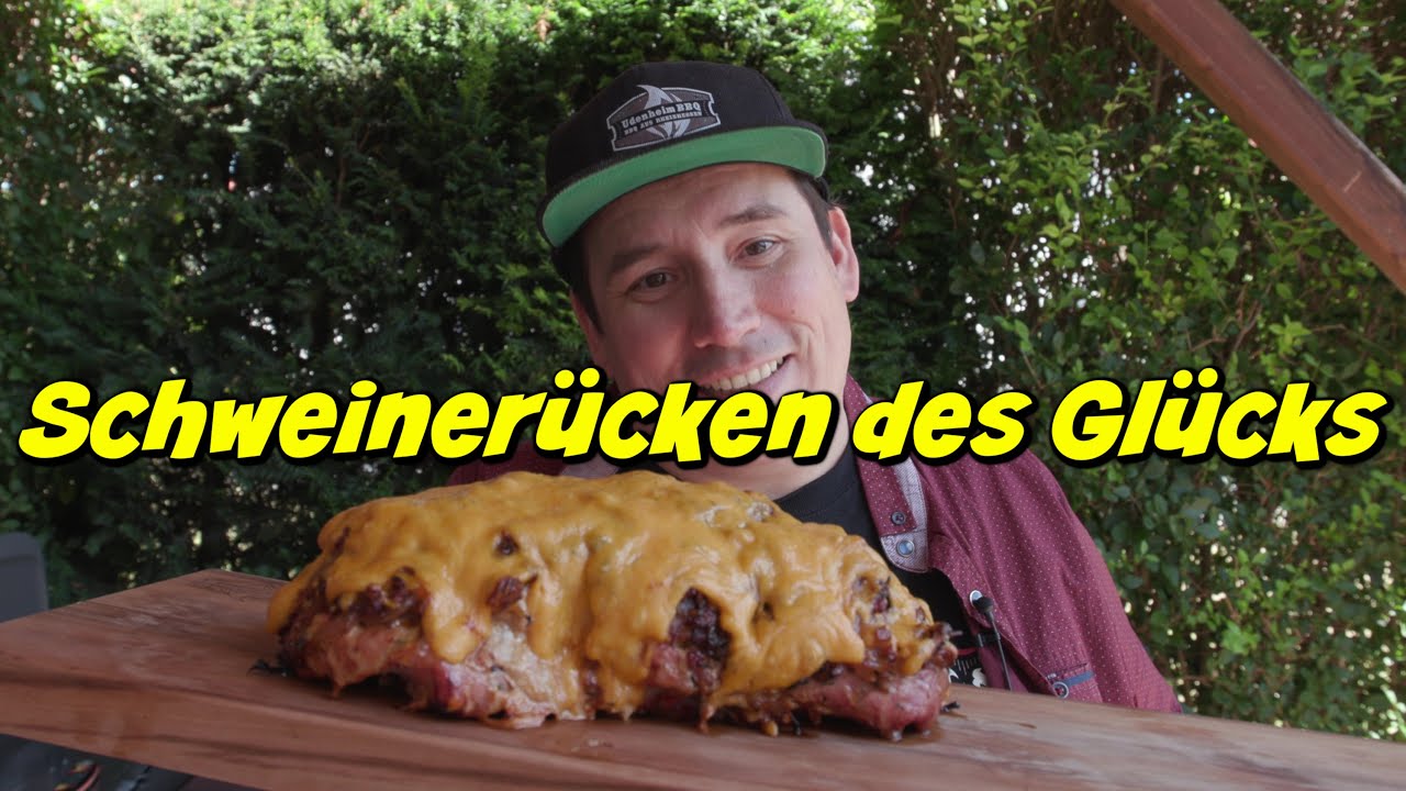 Schweinerücken mit Bacon, Zwiebeln und Cheddar vom Grill