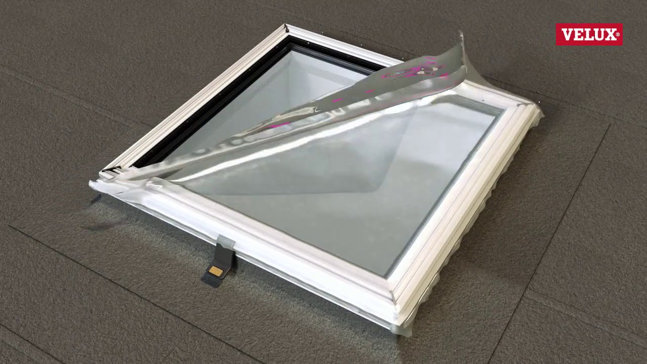 Installation d'une fenêtre de toit plat avec verre courbé