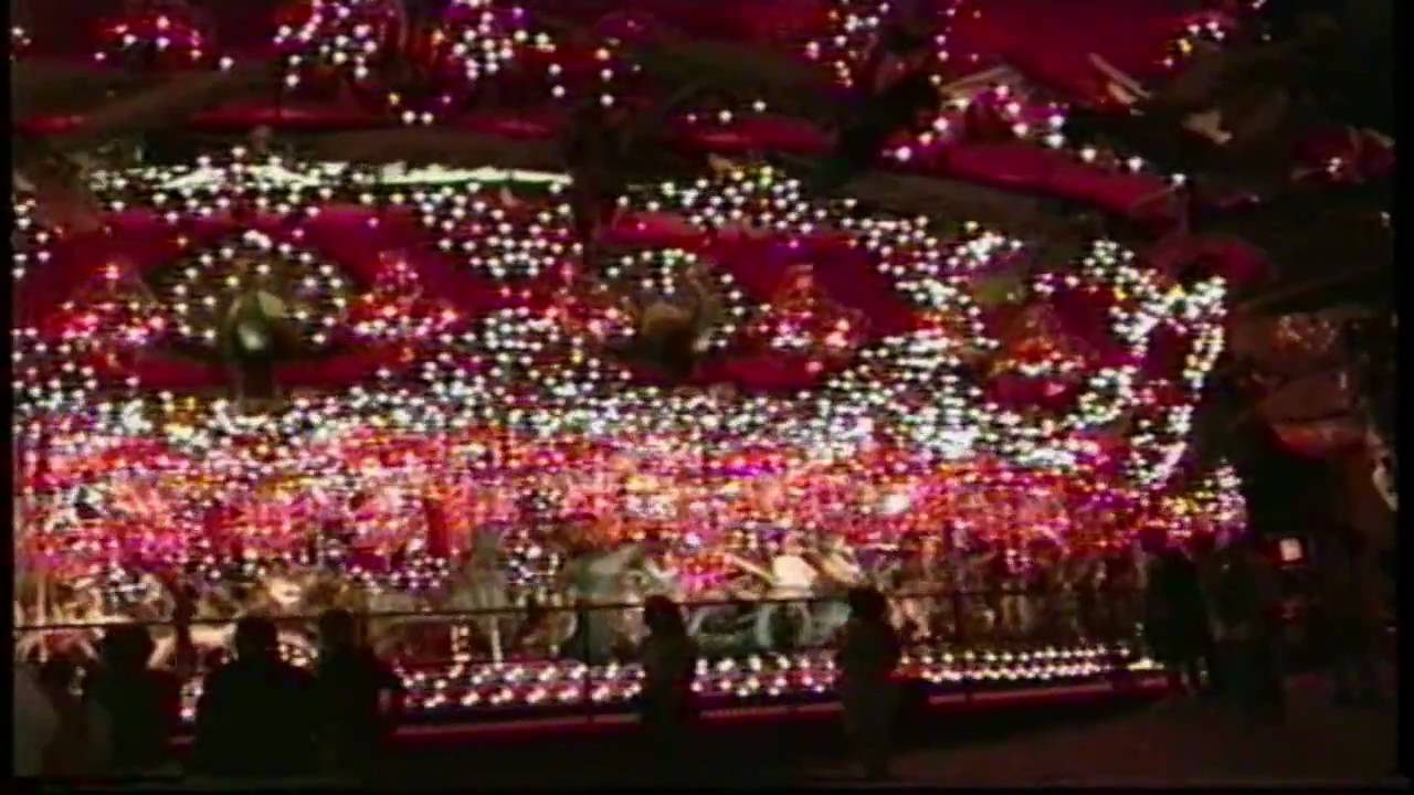 CAROUSEL LARGEST IN THE WORLD WITH 20,000 LIGHTS, 182 CHANDELIERS, 269 ANIMALS. COST $5,000,000.