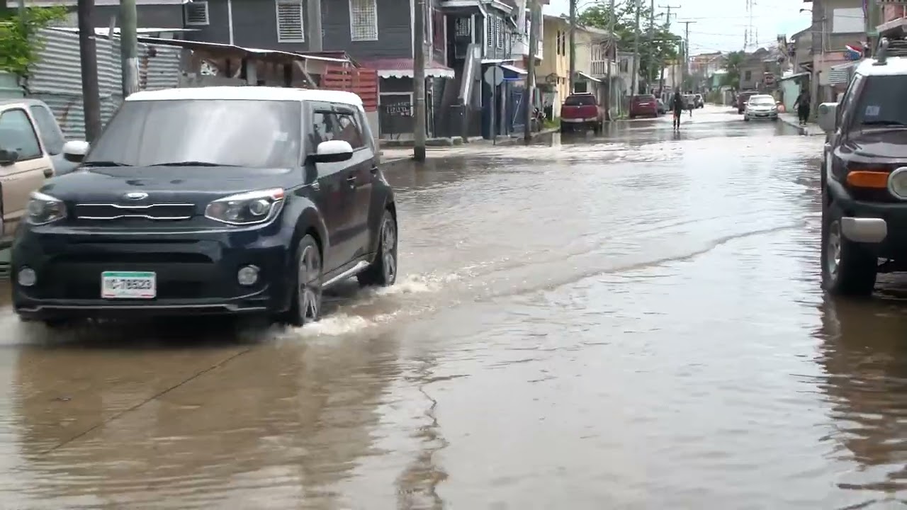 Floodwaters and High Tide Inundate Belize City Streets