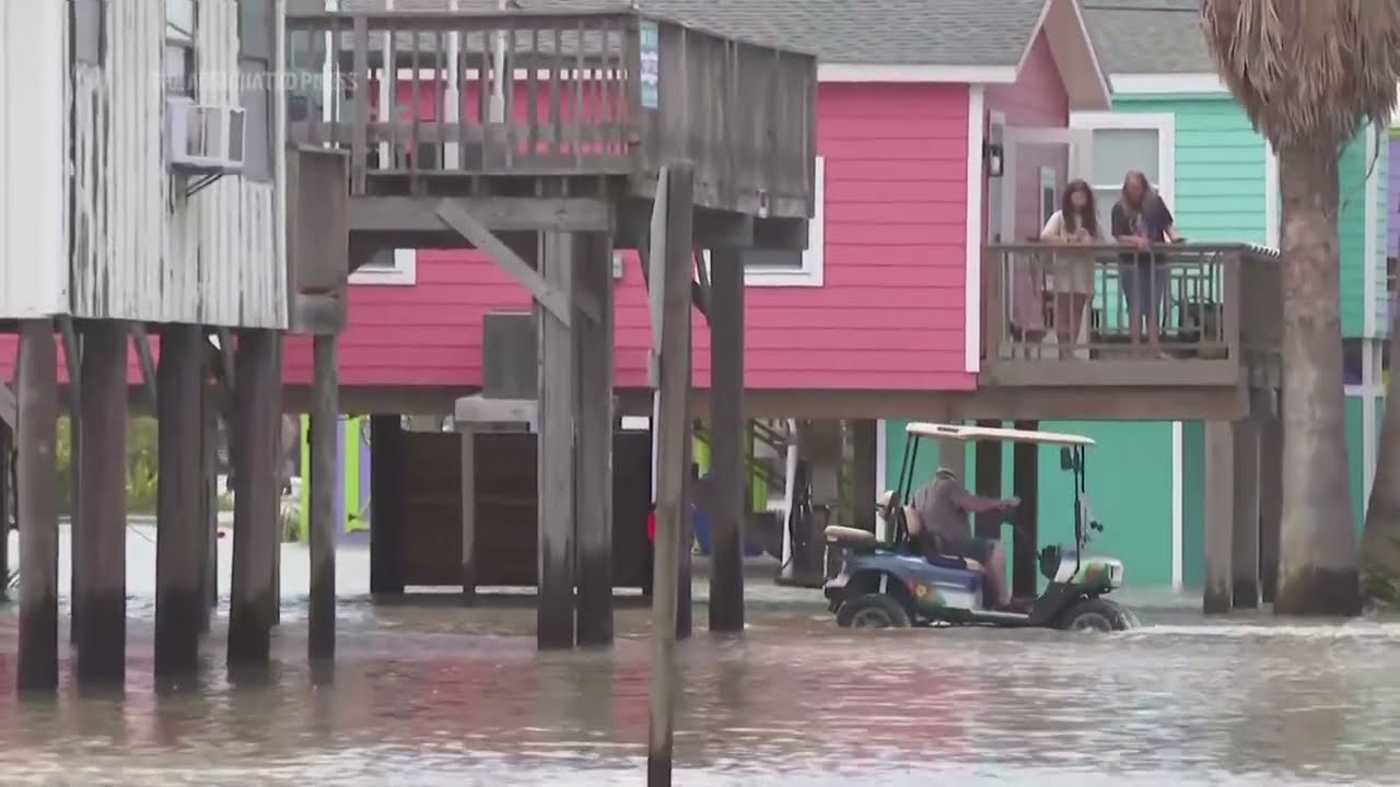 Flooding left behind from Tropical Storm Alberto in Surfside Beach, Texas