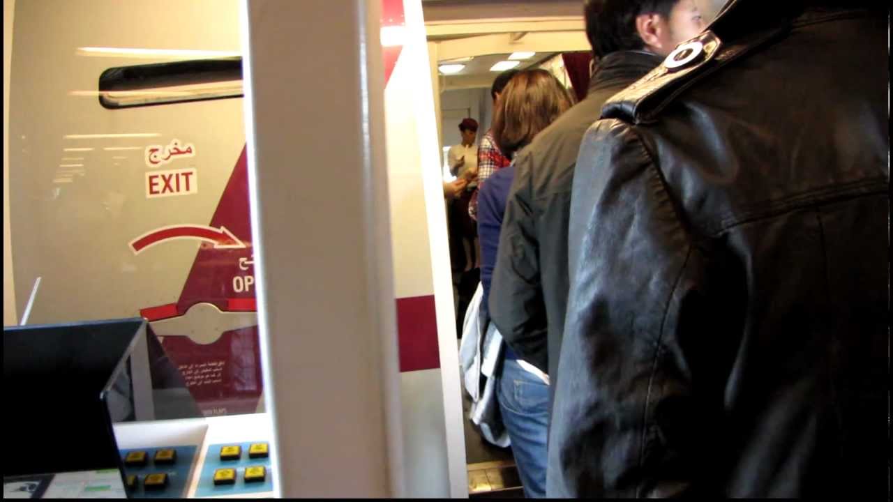 Boarding Qatar Airways B777-300ER aircraft in Singapore