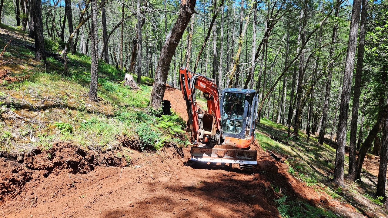 Losing my lunch on steep hilside trail building Kubota KX 040 4
