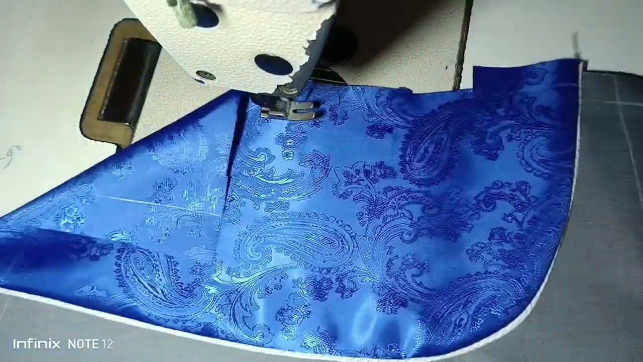 paglagay Ng piping sa lining at pagkabit sa lapel ng suit.