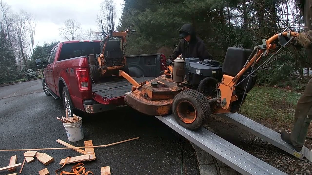 Making one good mower out of two. SCAG 52