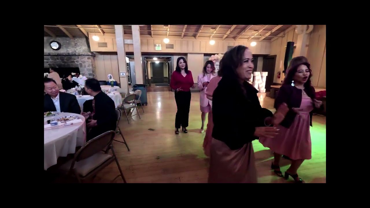 Lao song: ai ma tee lung. (cover). at a Lao-American party.