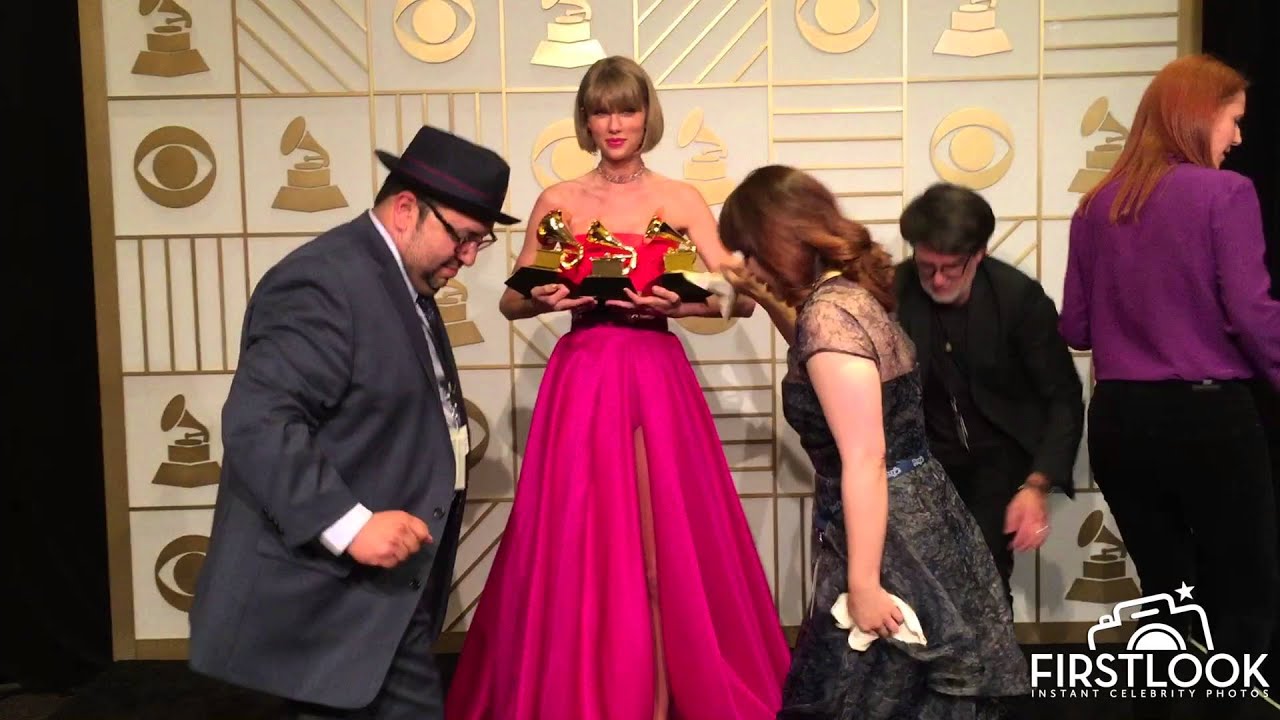 TRIPLE GRAMMY WINNER Taylor Swift in the press room at the 58th GRAMMY Awards