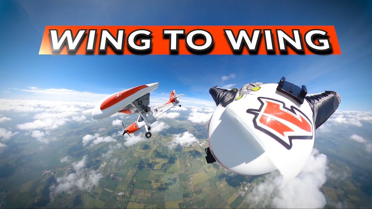 Wing to Wing - Skydive Wingsuit Flying Next To Plane SM92 Finist