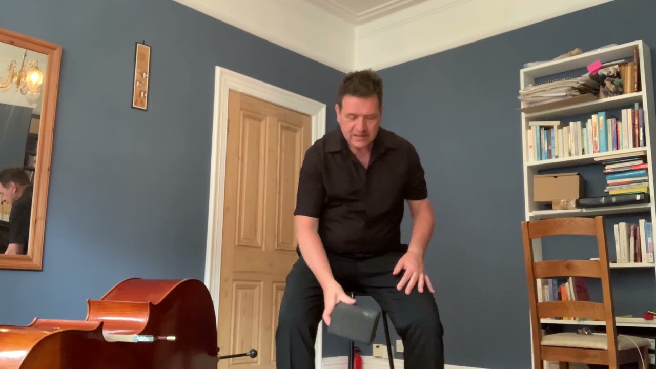 The essentials of orchestral double bass playing-sitting position and posture.