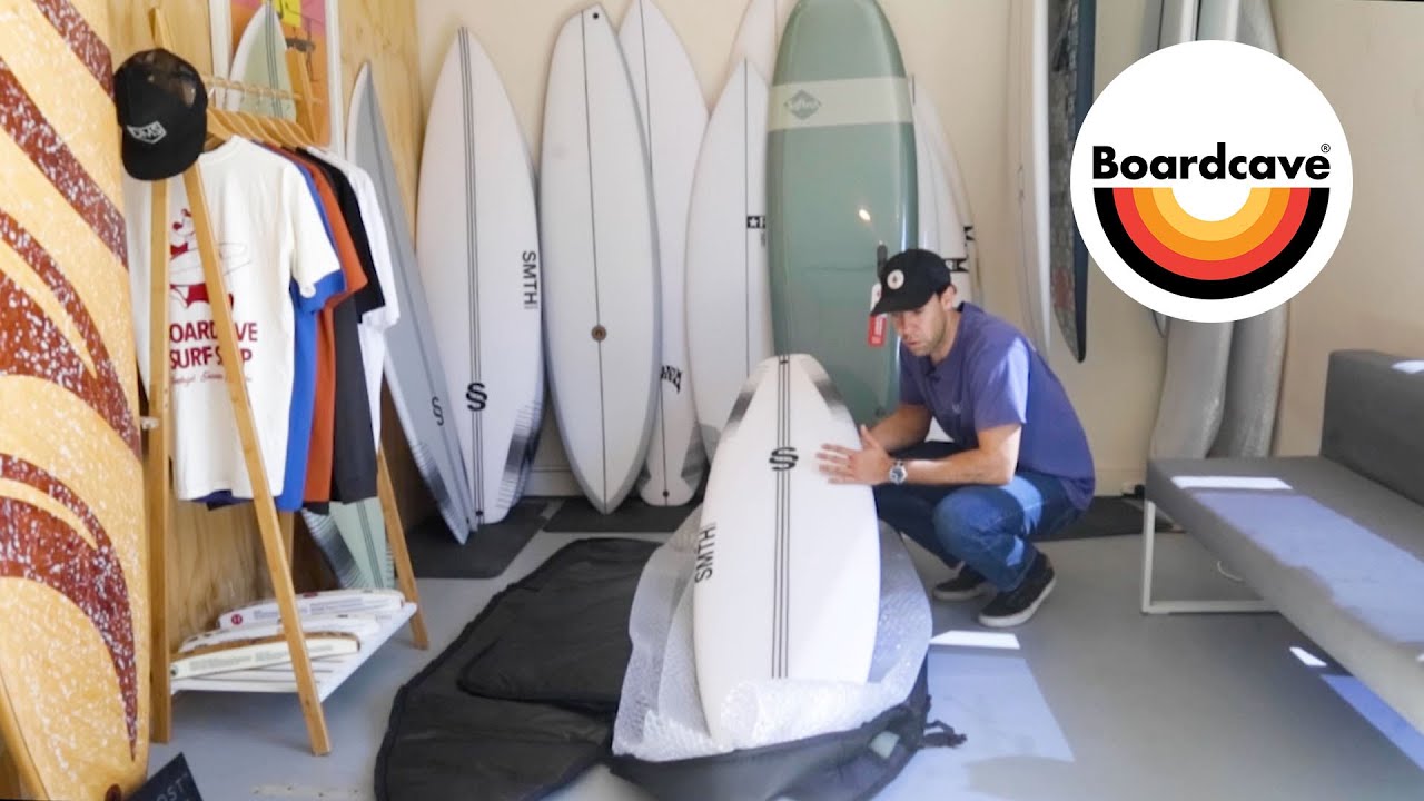 How to pack a surfboard bag