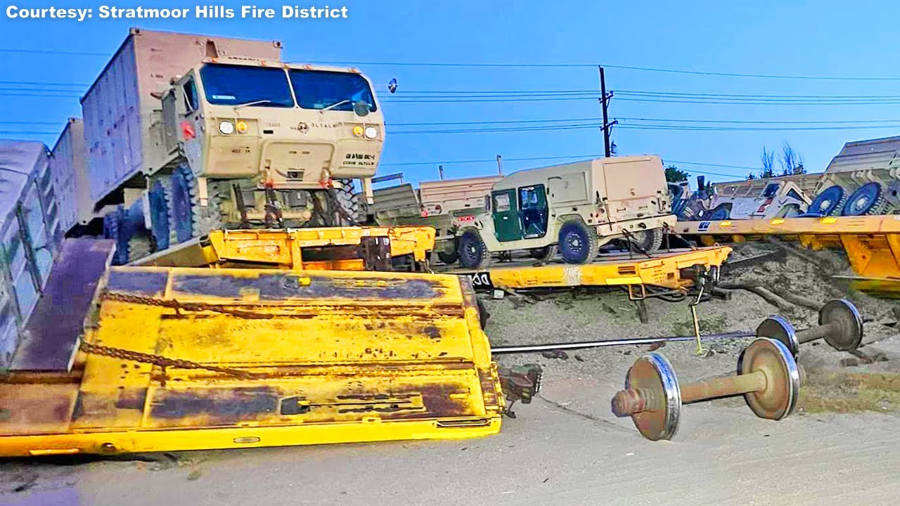 Train Hauling Military Vehicles DERAILS