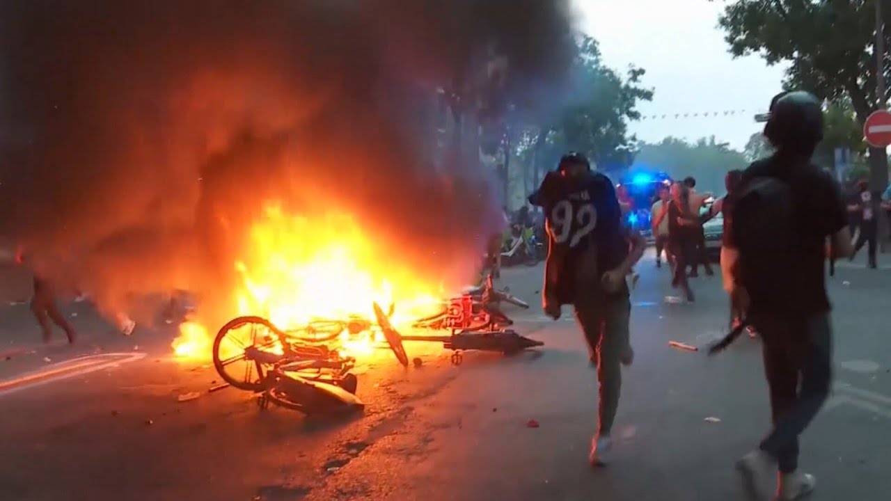 Paris Saint-Germain celebrations turn violent as fans clash with police in Paris