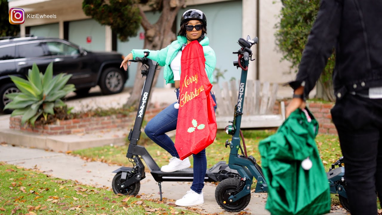 We rode around with electric scooters Giving Gifts