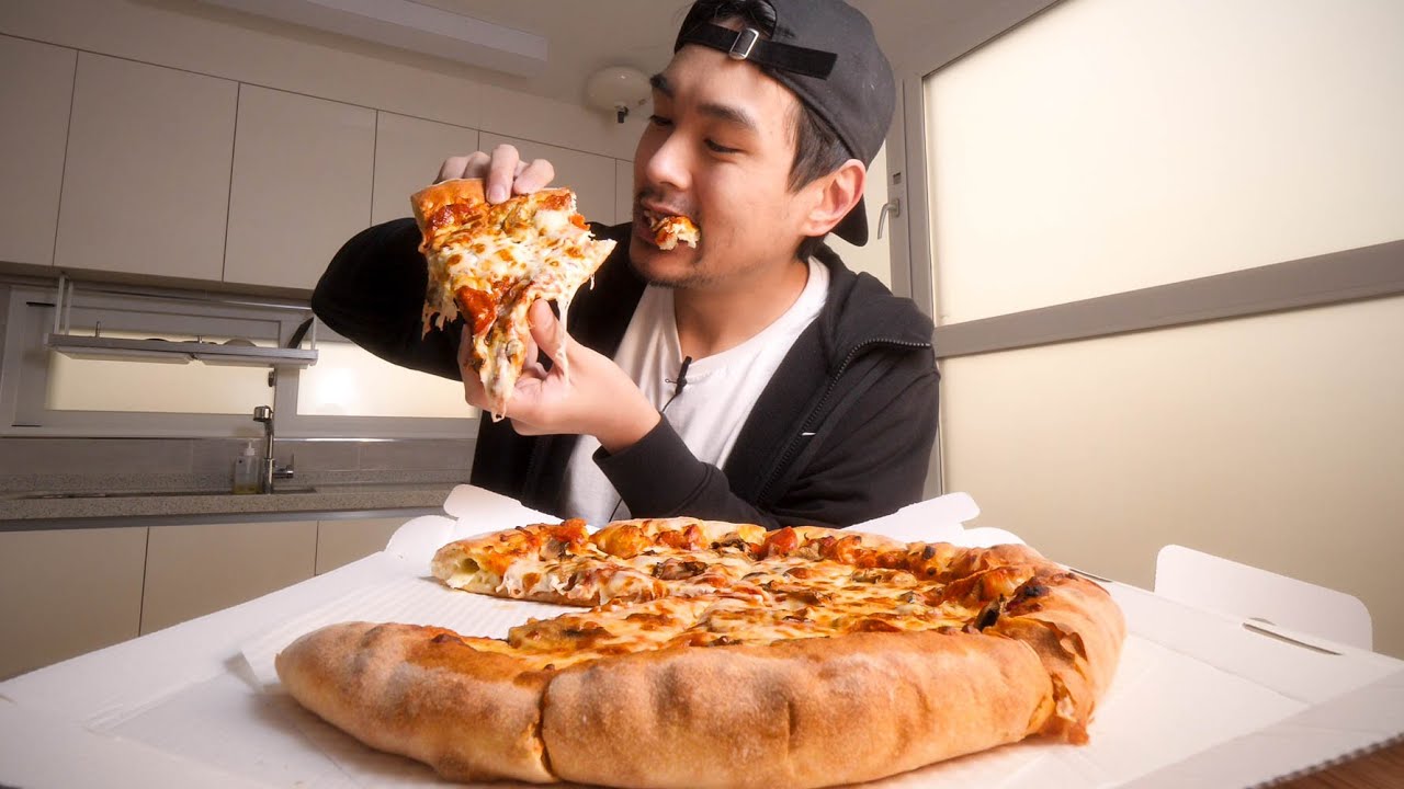 Eating a stuffed crust pizza crust first.