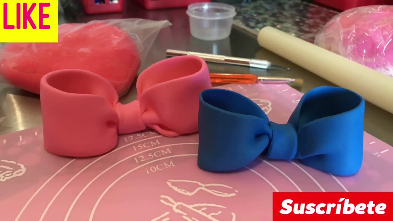 Como hacer moños en fondant