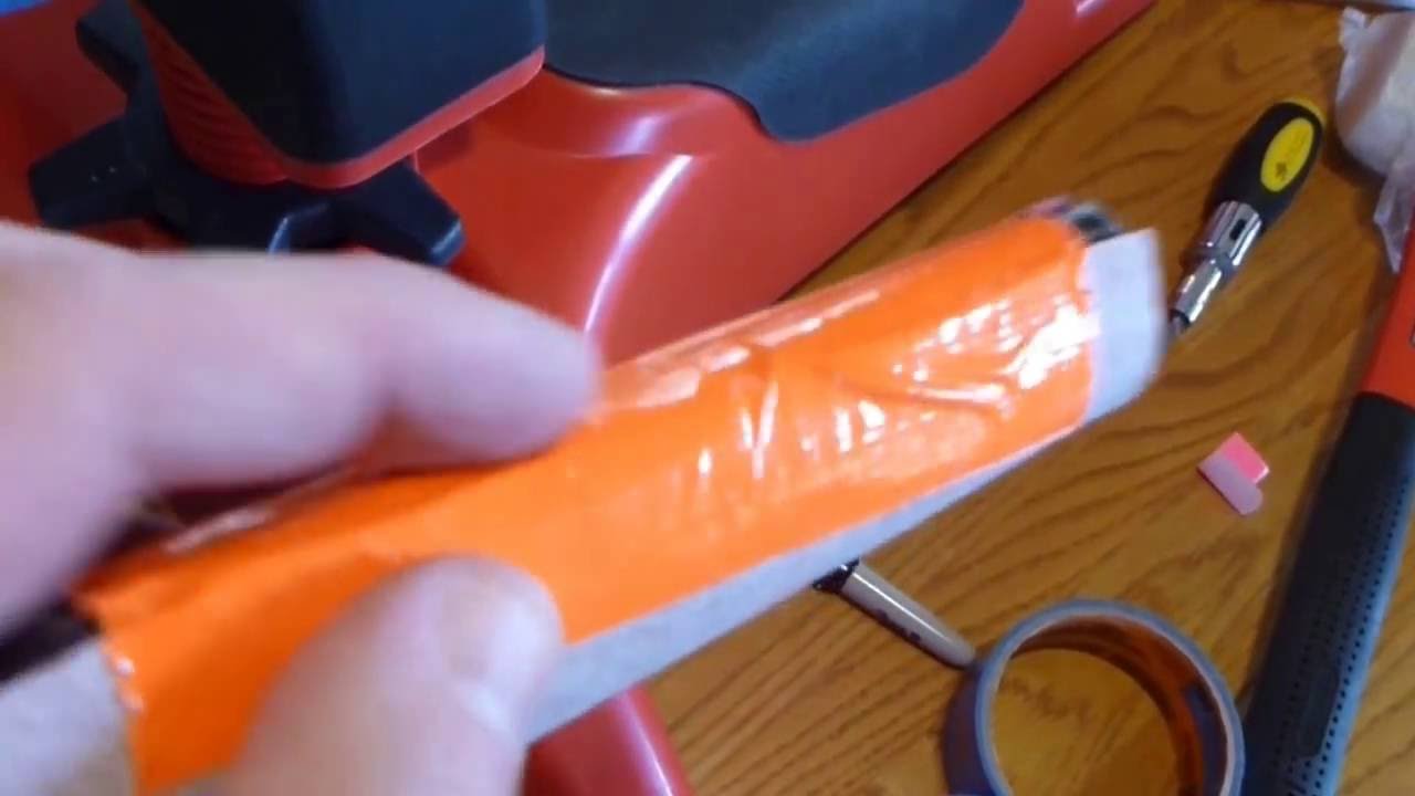 Sanding the barrel groove on a rifle stock