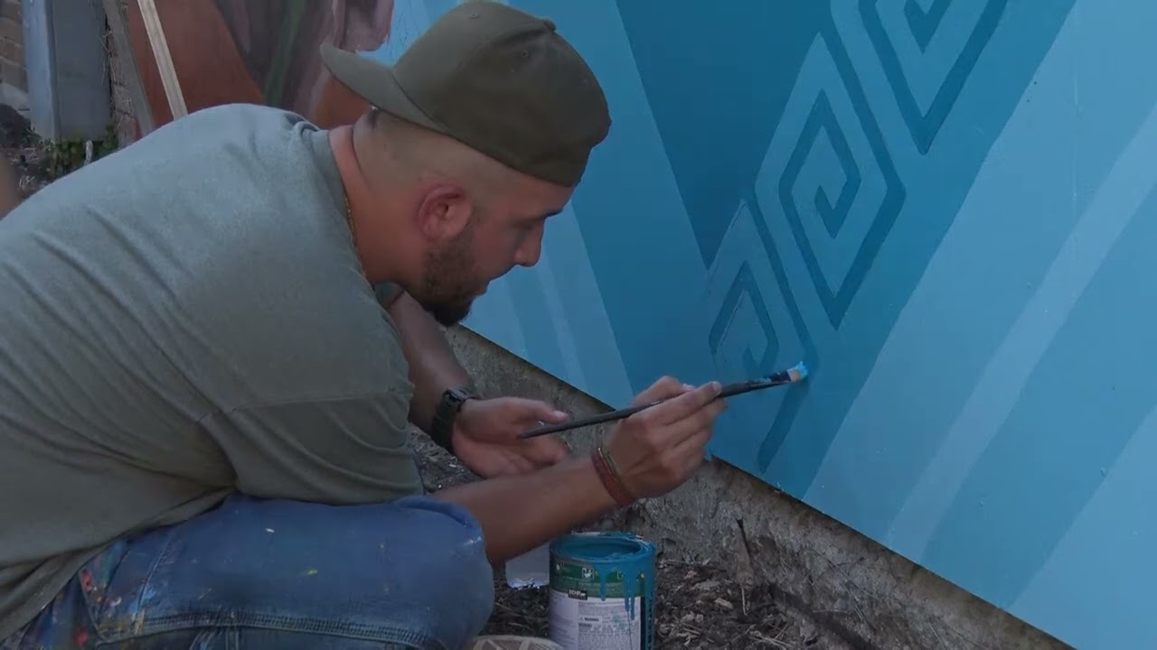 Roots Art Kollective mural at SLCC South City Campus