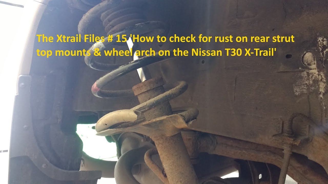 Checking for rust around rear suspension top mount of T30 Nissan X-Trail