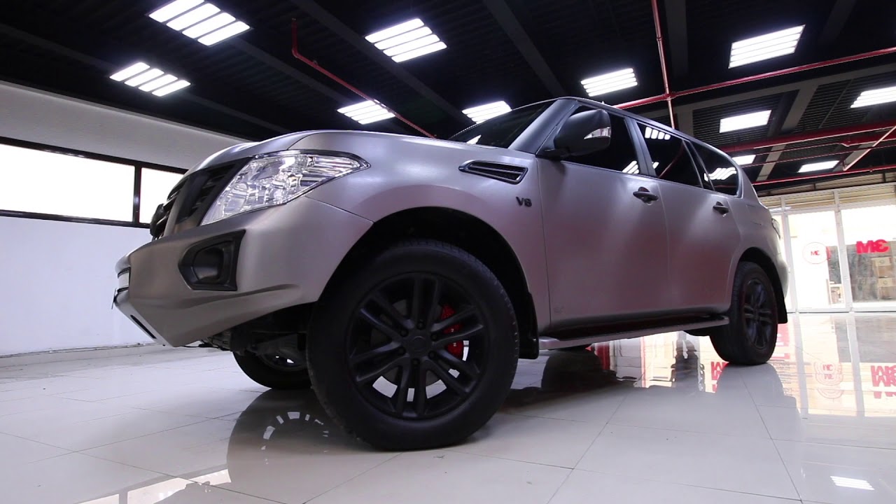 Nissan titanium Body wrapping with silver matt