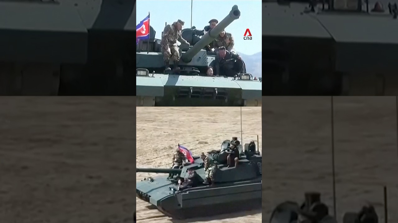 Kim Dzong Un jedzie czołgiem prowadzonym przez c&oacute;rkę Ju Ae podczas p&oacute;łnocnokoreańskich ćwiczeń wo...