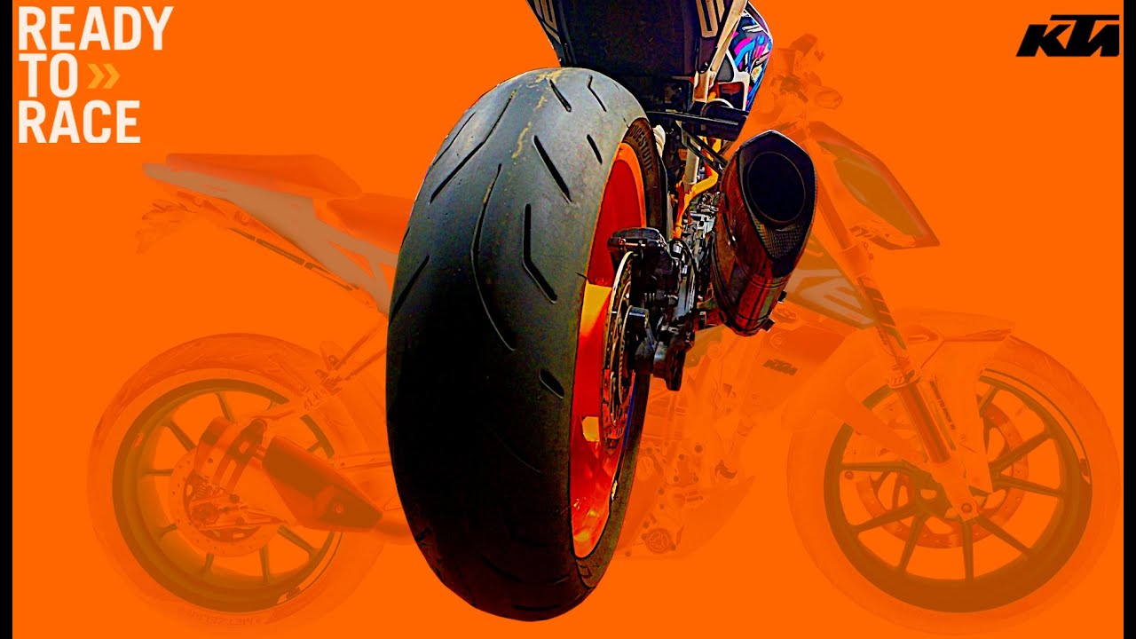Снятие и установка заднего колеса KTM Duke 390, 125, 200, 250