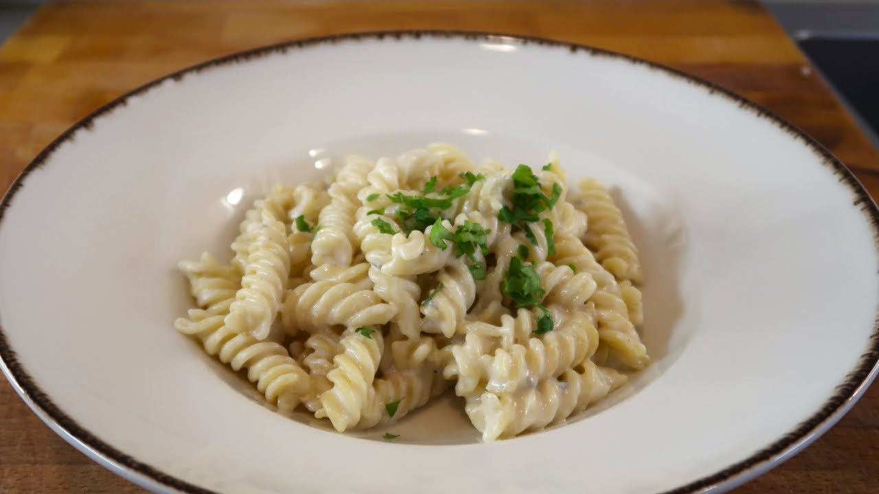 Experience the Creamy Delight of Our Four Cheeses Pasta! 🧀🍝✨